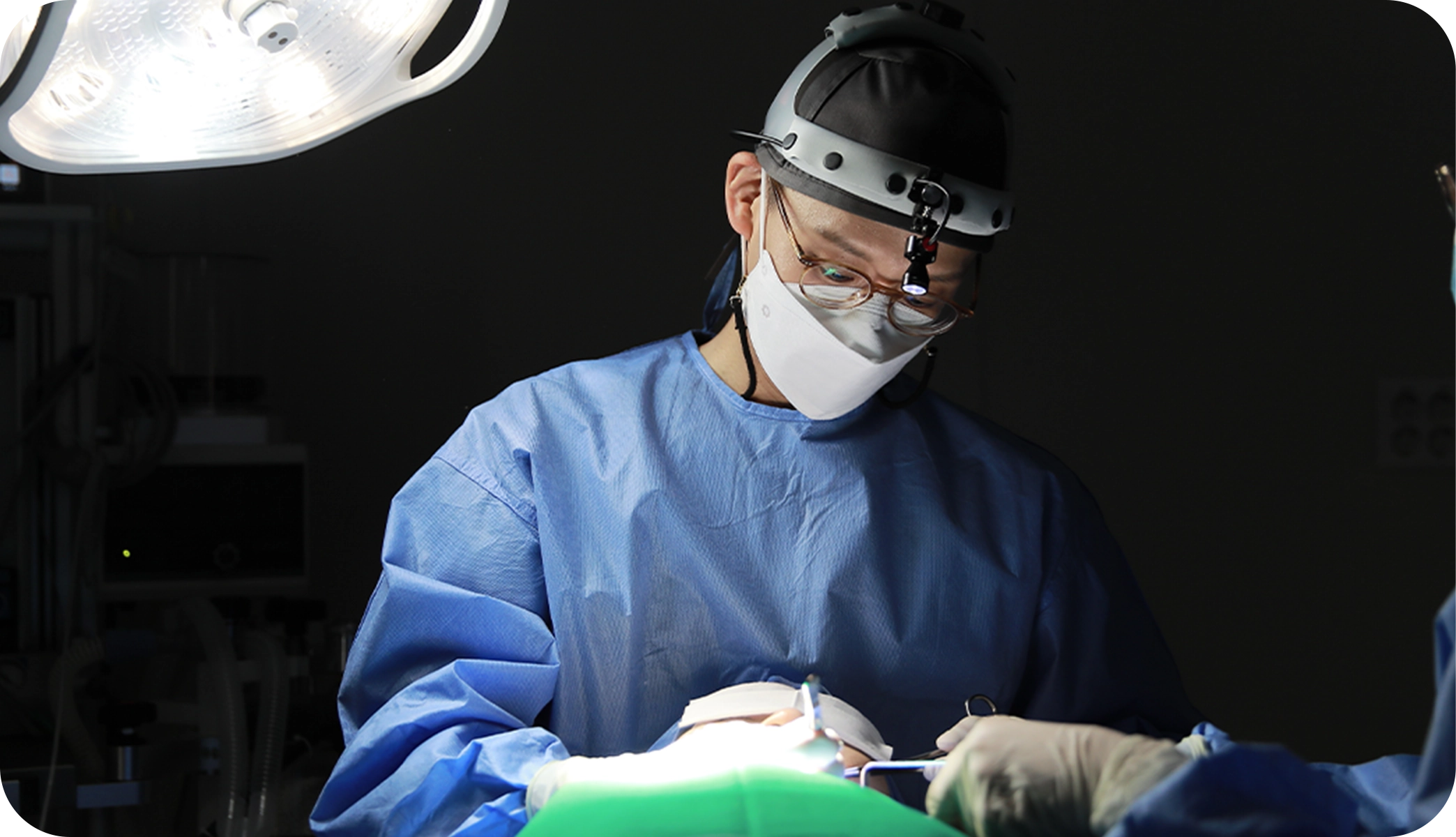 Surgeon performing 345 plastic surgery for natural results. Medical professional in operating room.