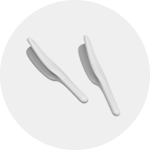 Two white plastic surgery tools for a natural 345 plastic surgery result.