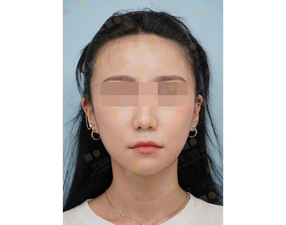 Person with pixelated face, blue background