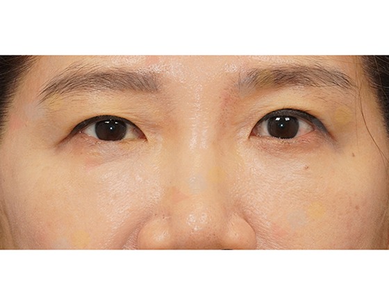 Close-up of woman's eyes and eyebrows.