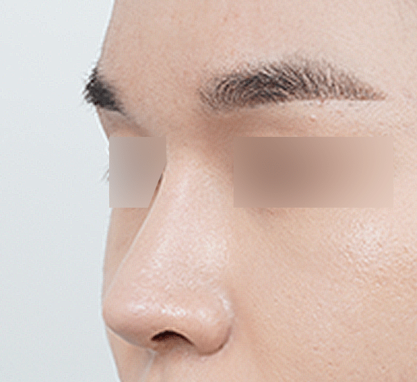 Close-up of a person's side profile.